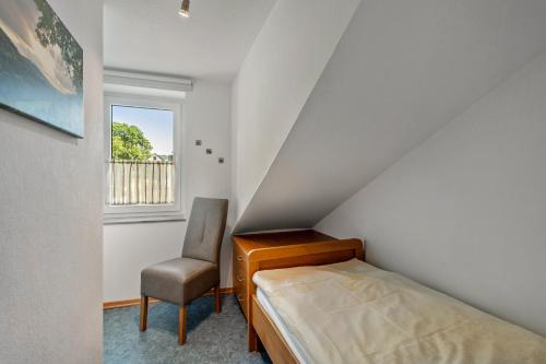 Postel nebo postele na pokoji v ubytování Ferienwohnung Hacke