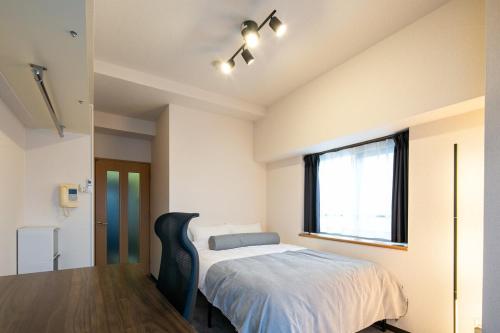 Postel nebo postele na pokoji v ubytování Work Friendly Room 3 min to Station Simmons Bed WiFi and Desk