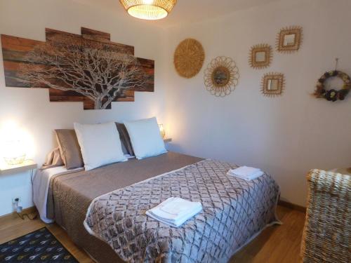 Postel nebo postele na pokoji v ubytování Chez Marie