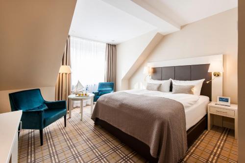 Postel nebo postele na pokoji v ubytování Hotel Birke, Ringhotel Kiel