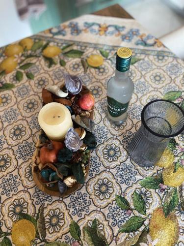 a plate of food and a bottle of water on a table at Pyrgadikia Treasure in Pyrgadikia