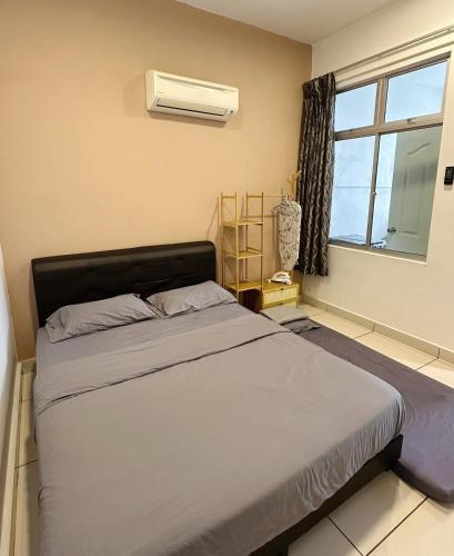 Katil atau katil-katil dalam bilik di Taiping Centre Point Suite 9 by BWC