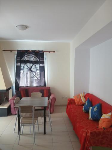 Ruang duduk di Maria De luxe Apartment