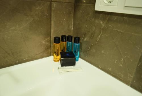 a group of three pens sitting on top of a counter at Uçar Royal Hotel ve Konferans Salonu in Sile