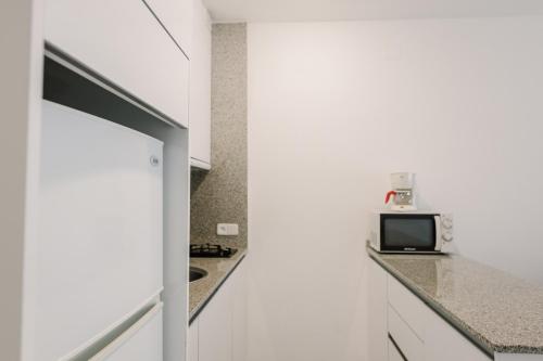 Kuchyň nebo kuchyňský kout v ubytování Hotel Lodomar Spa & Talasoterapia