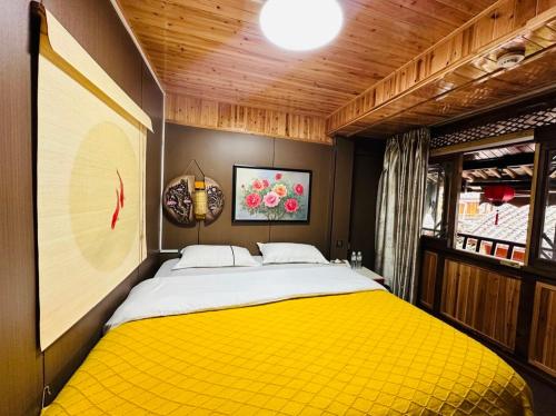 Una cama o camas en una habitación de Lewo Guest House