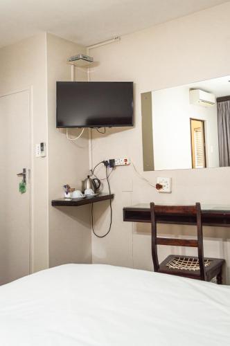 Hydro Guesthouseにあるテレビまたはエンターテインメントセンター
