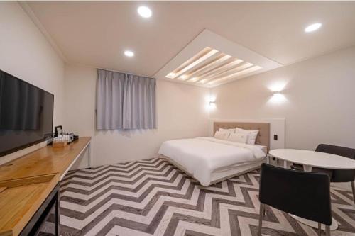 TV o dispositivi per l'intrattenimento presso Yangsan Cadeo Hotel