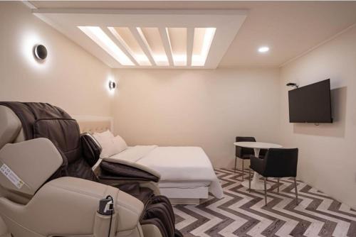 TV o dispositivi per l'intrattenimento presso Yangsan Cadeo Hotel