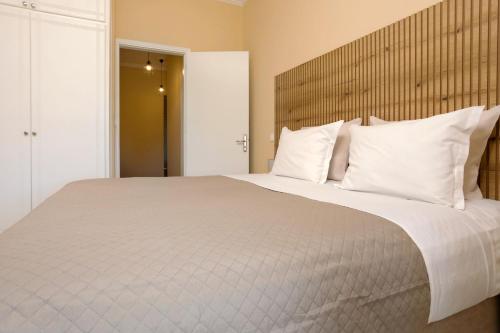 Katil atau katil-katil dalam bilik di Ammos Comfort Apartments, 400m from Kalamaki Beach, by ZanteWize