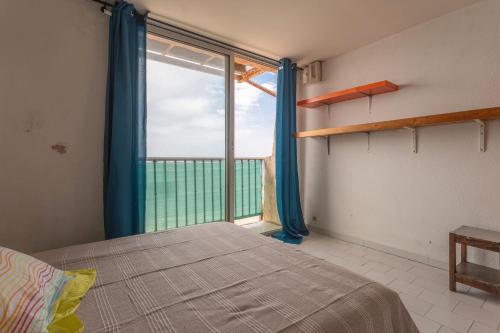 Postel nebo postele na pokoji v ubytování Porte Rouge 2