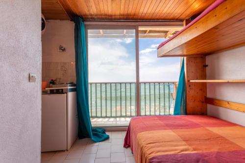 Postel nebo postele na pokoji v ubytování Porte Rouge 4