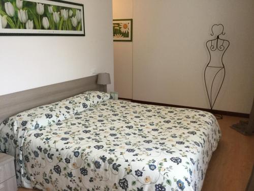 Łóżko lub łóżka w pokoju w obiekcie Albergo Belvedere