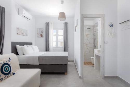 Ένα ή περισσότερα κρεβάτια σε δωμάτιο στο Palma Elegant Suites