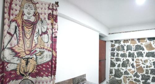 a mural of a goddess on the wall of a room at Depto Zona UV Los Lagos Isleta 101 in Xalapa