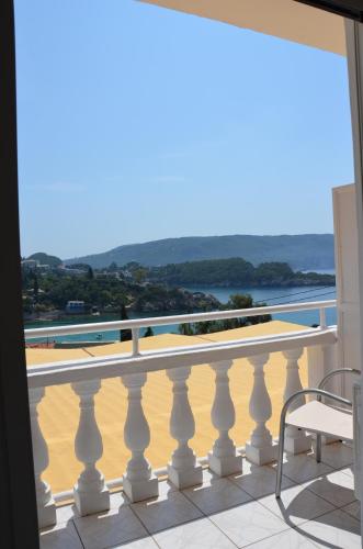 a balcony with a view of the ocean at Odysseus Hotel in Paleokastritsa