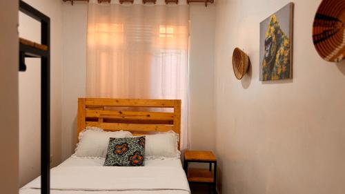 Llit o llits en una habitació de Ingoga Place