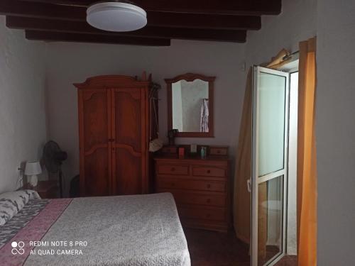 Postel nebo postele na pokoji v ubytování Villa Manolita