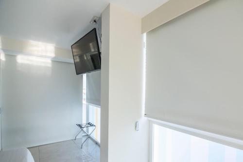 TV a/nebo společenská místnost v ubytování Hotel Boutique TAO Caleta Mar