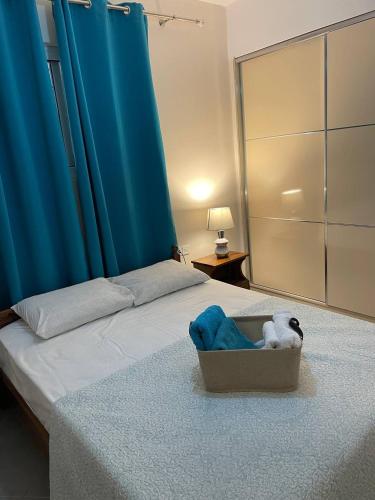 Llit o llits en una habitació de May Apartments