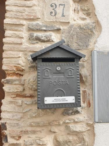 a plaque on the side of a stone wall at IL PRINCIPE in Rotondella