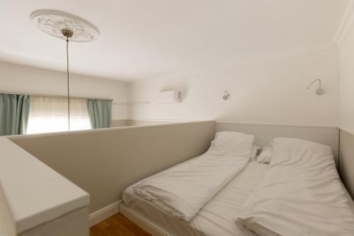 Krevet ili kreveti u jedinici u objektu Lisianthus Apartments