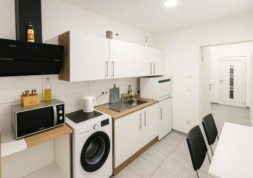 Køkken eller tekøkken på Betty Apartment