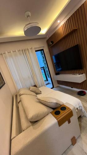 Televisyen dan/atau pusat hiburan di Orla Recreio Prainha
