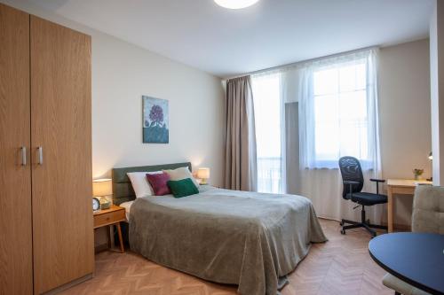 En eller flere senge i et værelse på Upisa Studio Apartments