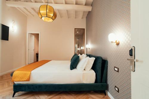 a bedroom with a large bed in a room at Casa mia Navona Rooms in Rome