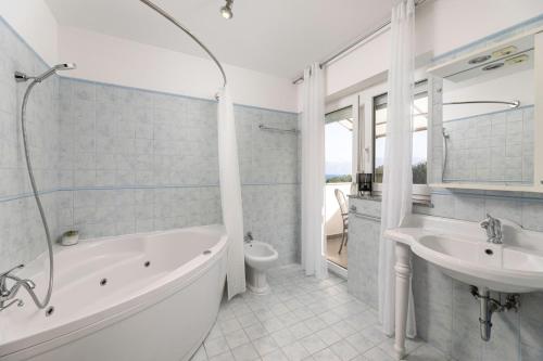 Kúpeľňa v ubytovaní Apartments Wow Barbalic