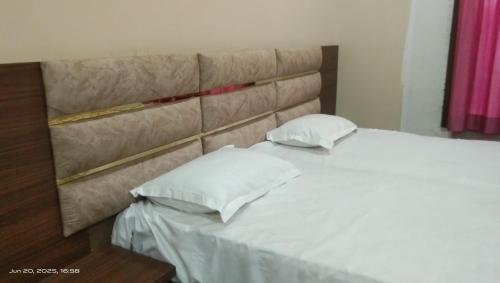 Ronak homestayにあるベッド