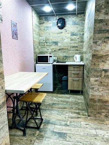 Кухня или мини-кухня в Апартаменты в центре Кривого Рога
