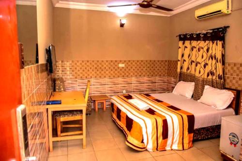 Postel nebo postele na pokoji v ubytování Abba Suites