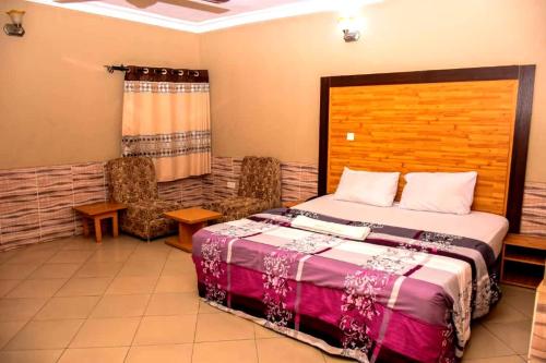Postel nebo postele na pokoji v ubytování Abba Suites