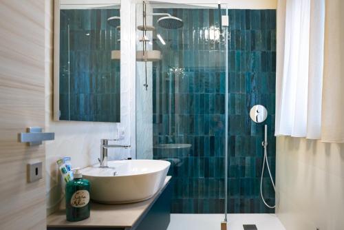 a bathroom with a sink and a shower at Casa Alice in Cetara