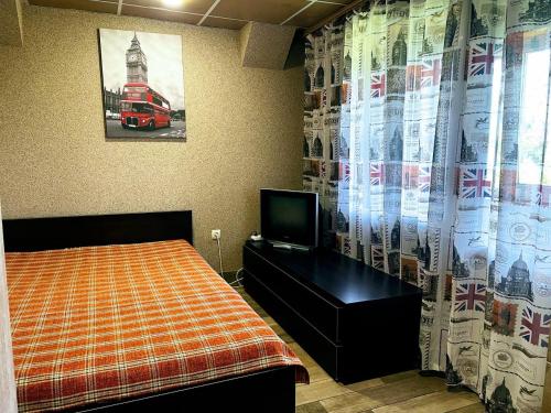 Кровать или кровати в номере Апартаменты в центре Кривого Рога