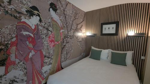 Logis Hôtel Lafayette Rochefort Franceにあるベッド