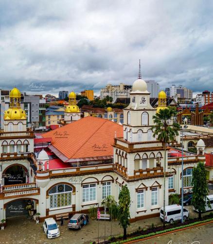 a view of a city with a building at Dhia Homestay Sireh Residence Near Aeon Mall in Kota Bharu