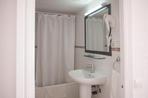 Ванная комната в Hostal Los Pinos