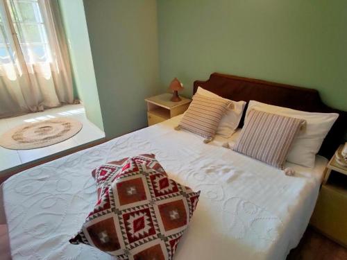 Postel nebo postele na pokoji v ubytování Galini Hotel Agios Ioannis Pelion