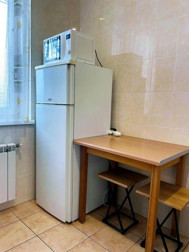 Кухня или мини-кухня в Апартаменты в центре Кривого Рога
