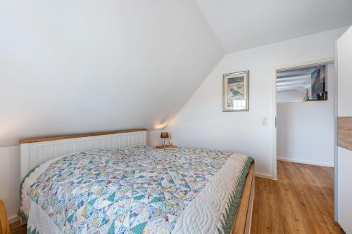 Postel nebo postele na pokoji v ubytování Nordseeperle