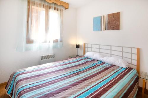 Postel nebo postele na pokoji v ubytování Hameau 2 211 SPA & PISCINE appartement 6 pers