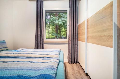 Postel nebo postele na pokoji v ubytování Seeperle 2