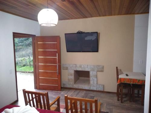 Μια τηλεόραση ή/και κέντρο ψυχαγωγίας στο Chalés vale da mata