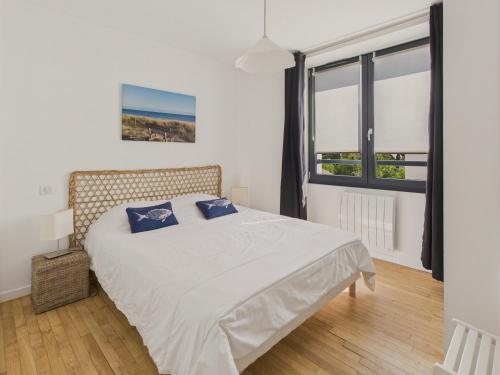 Ένα ή περισσότερα κρεβάτια σε δωμάτιο στο 400 m plage - Fouesnant Beg Meil - Appart pour 4