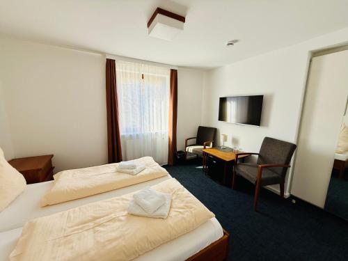 Una cama o camas en una habitación de Haus Rooad Weeter