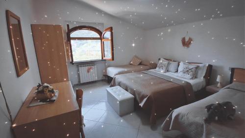 Ένα ή περισσότερα κρεβάτια σε δωμάτιο στο Hotel affittacamere novella