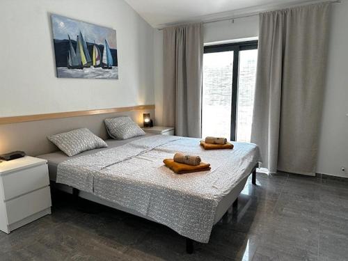Postel nebo postele na pokoji v ubytování House Monique